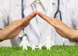 close-up-picture-doctor-s-hands-posting-symbol-home-family-member-model