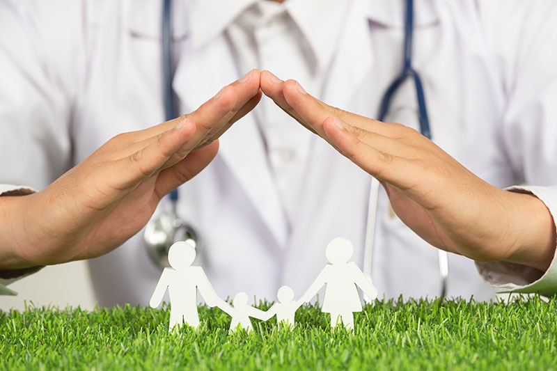 close-up-picture-doctor-s-hands-posting-symbol-home-family-member-model